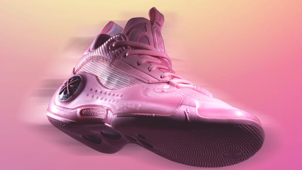 Side view of Dwyane Wade's pink basketball shoes.
